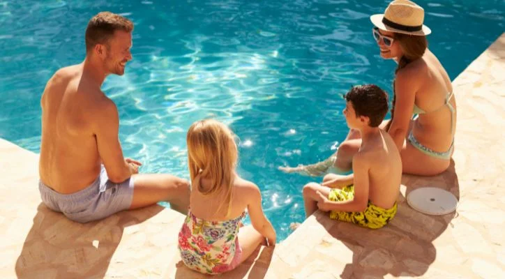 A family at the pool