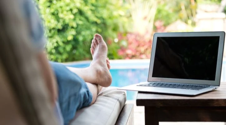 a man relaxing at the pool