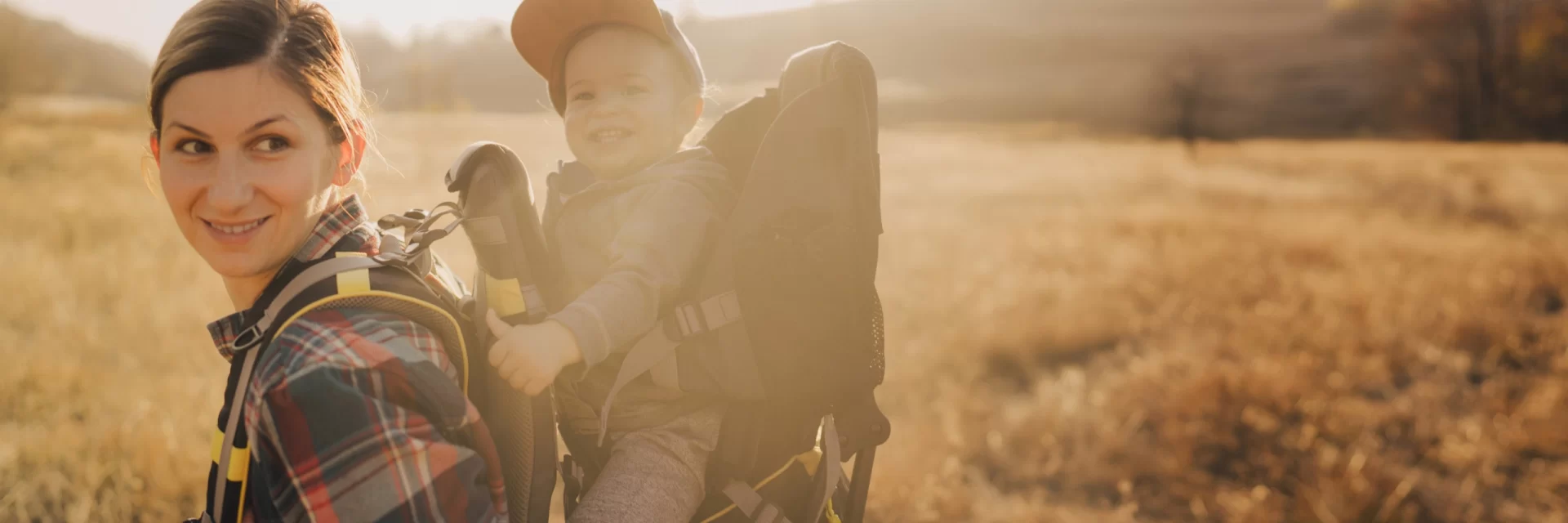 A mother hiking with a baby